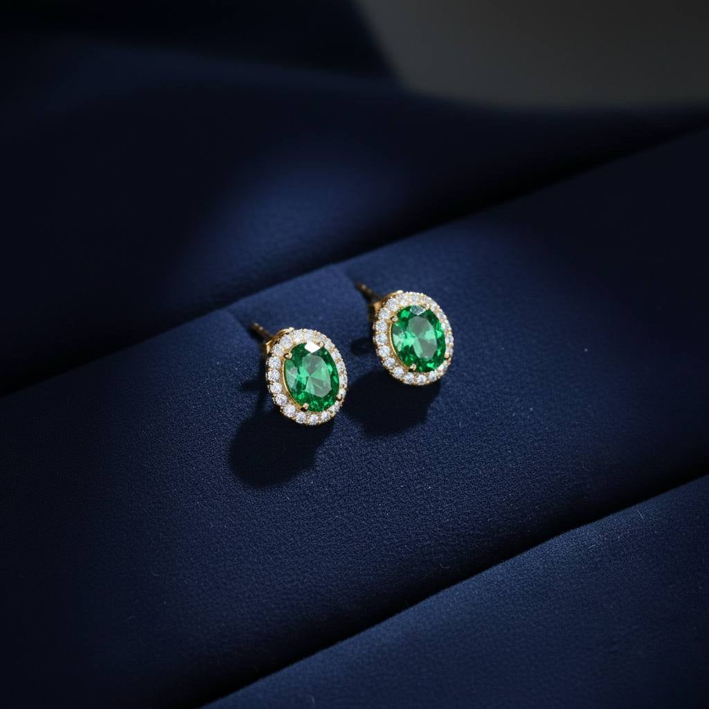 Abidii Eternity Set – oval halo pendant necklace with matching oval stud earrings displayed on a soft fabric surface, showing their timeless, luminous design.