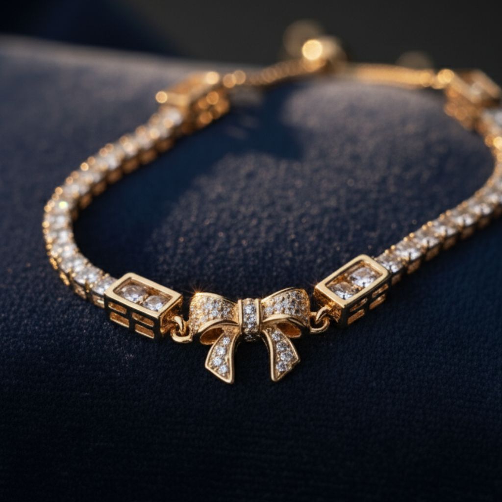 Abidii Loyalty Knot Bracelet – rose-gold-tone  bracelet with pavé bow centre and slider closure, displayed on dark fabric in soft light.