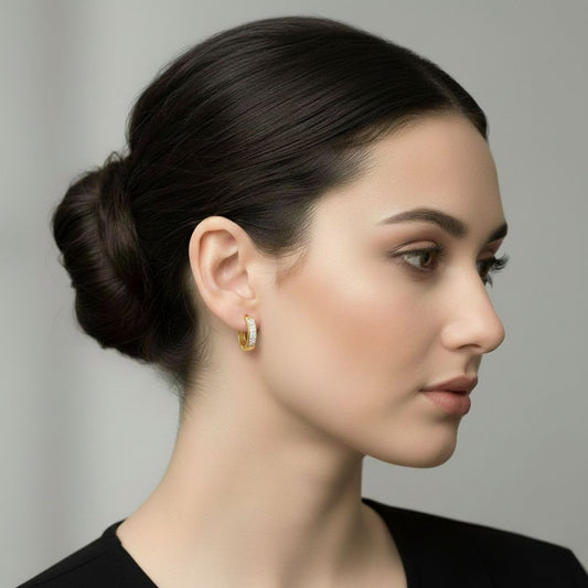 Abidii Nova Hoops – gold-tone pavé hoop earrings worn by the model, showing their minimal design and sparkling front.